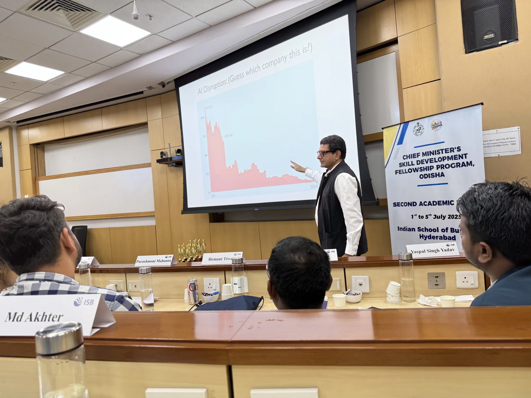 Kashyap Kompella teaching public-sector fellows at the Indian School of Business