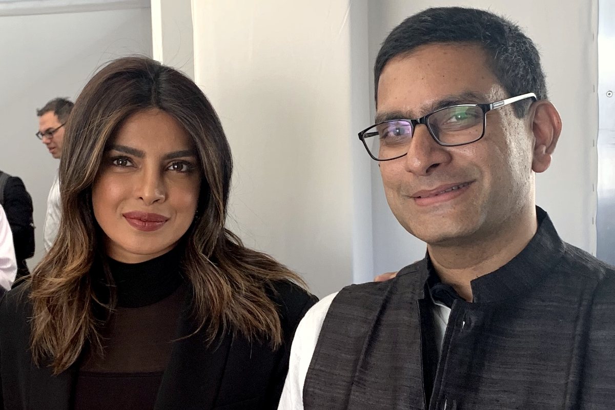 Kashyap Kompella at a public event with Priyanka Chopra