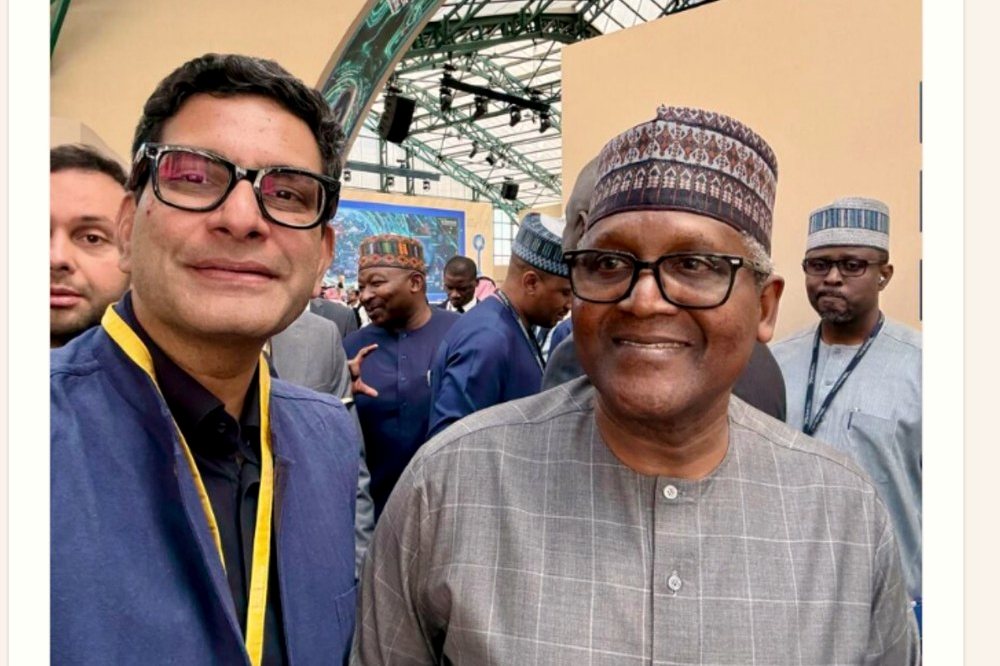 Kashyap Kompella at a public event with Aliko Dangote
