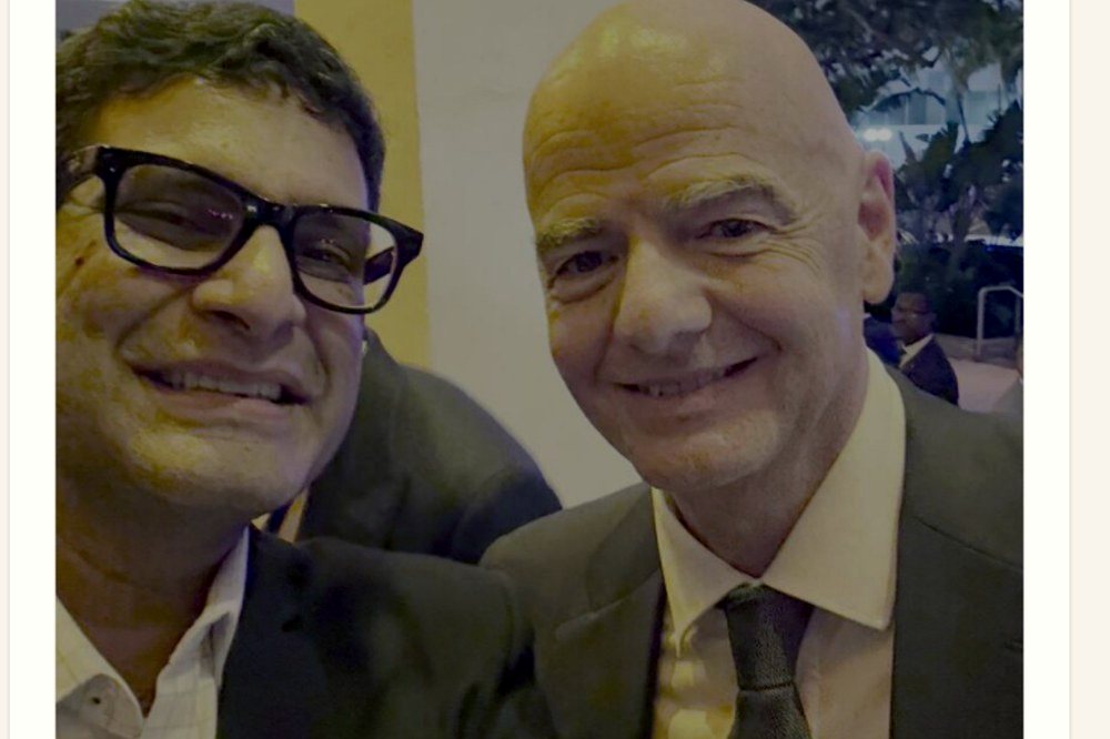 Kashyap Kompella at a public event with Gianni Infantino