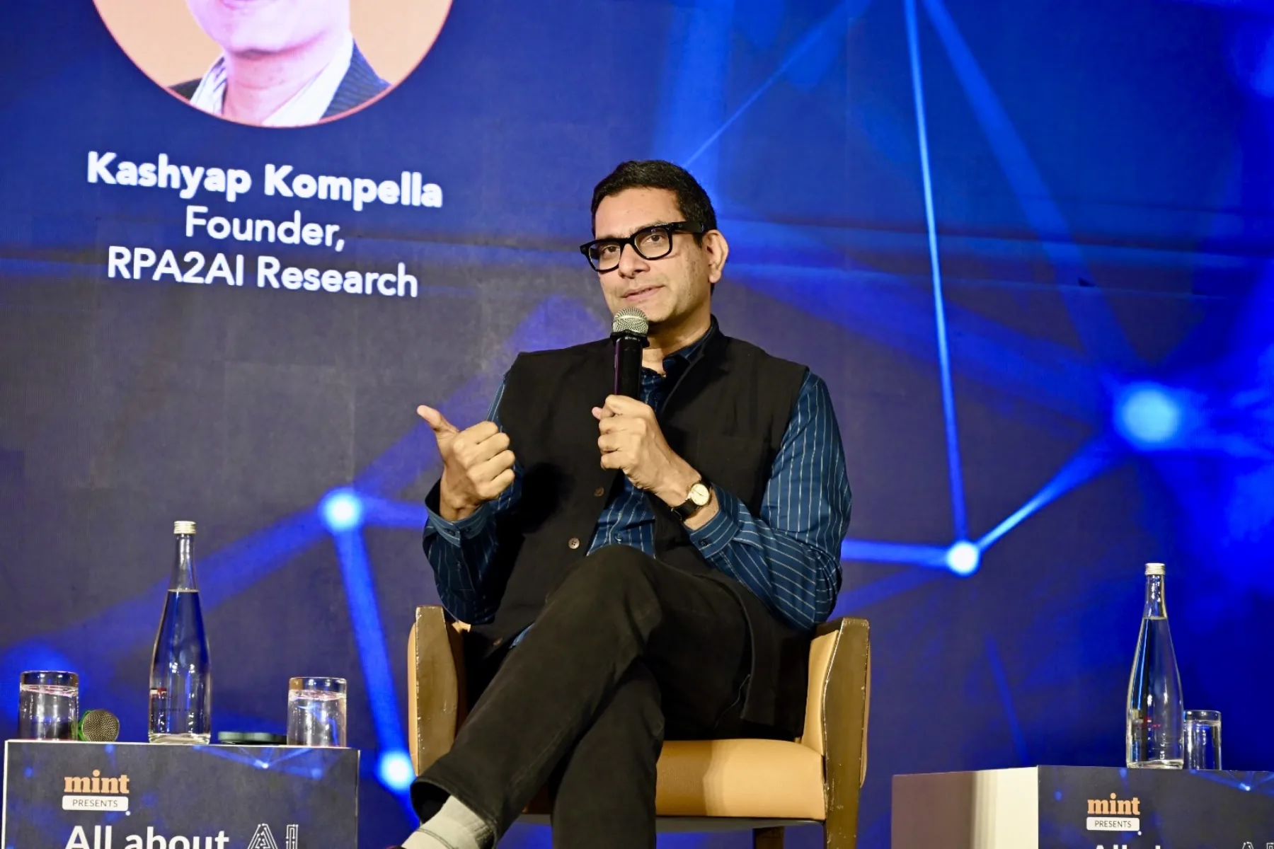 Kashyap Kompella speaking at an AI event organised by Mint